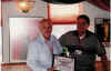 Paul Fusco receives Life Membership from Past President Norm.JPG (111790 bytes)