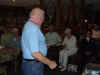 118 Gene Johnson receives team salute packet.JPG (86555 bytes)