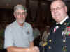 123 Jack Picciolo receives team salute packet.JPG (123515 bytes)