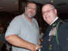 126 Rick Siebe receives team salute packet.JPG (120683 bytes)