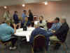 Copy of group gathering in hospitality room.JPG (125770 bytes)