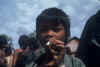 Mountain yard boy smoking.jpg (76816 bytes)