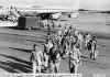 Flight home,L-R unk,Gary Gibs,Rick Simpkins.jpg (216903 bytes)
