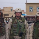 1SG Pepin, CSM Werkhieser and CSM Bronson at the border crossing gate between Iraq and Iran.