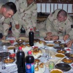 CPT Walker, CSM Werkhieser, LTC Price enjoying a meal at a local family home.