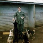 Webster Cole Feeding the Hounds at Doris K-1970