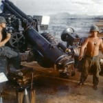 Carl Burton on trail, Cpl Skeens firing, calibrating howitzer