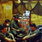 FB Colgan 6.jpg (21013 bytes) Some of the B 2/17th and Btn HQ’s officers relaxing in the bunker with chess game in progress. (M. Mason, 2nd from left, other names unknown)