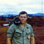 Mason 1.jpg (23884 bytes) 1LT M. Mason on assignment with 52nd ARTY group in support of operations near the Cambodian border summer of 1970.  Coatamundi on his shoulder.